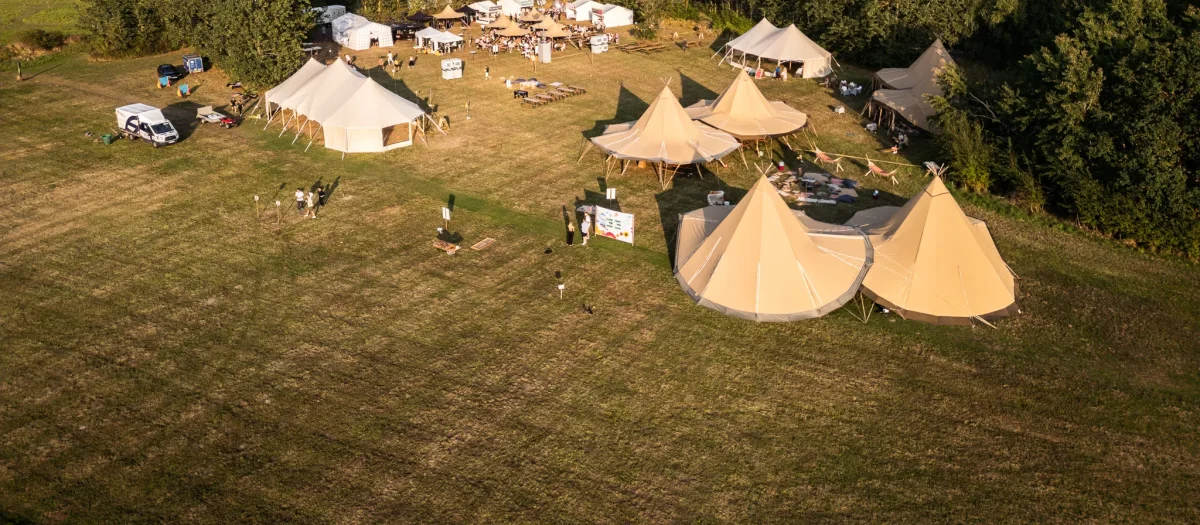 hNcYN65e-aerial-view-outdoor-teambuilding-camp.webp